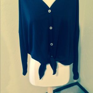 Black knit top with front tie. Never wore.